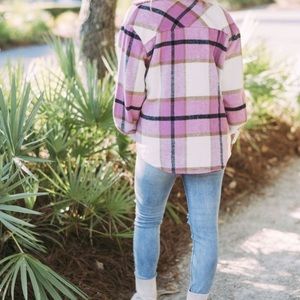 Multi color shacket. Never been worn. Size large.